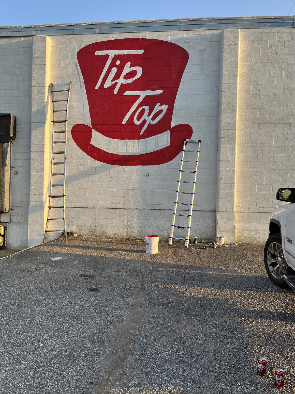 Tip Top Packing Co. mural on building wall - Since 1947